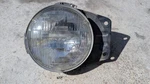 Datsun 240Z 260Z 280ZX Front Headlight Pair Mount Buckets And Sealed Beams. Fixed Price $110.00.