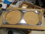 Headlamp Bezel./door N.O.S.1968 Chrysler 300 Model 2786696. Fixed Price $95.00.