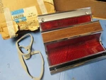 Lens And Deflector N.O.S.1968 Plymouth Fury Iii Wagons W/woodgrain 2809177. Fixed Price $45.00.