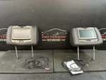 10-14 Cadillac Escalade Front Driver & Passenger Seat Headrests W/ Dvd Screens. Fixed Price $200.00.
