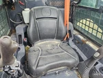 John Deere 318G Seat - Used P/n AT522527. Fixed Price $639.99.
