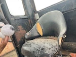John Deere 670 Seat - Used P/n AR26632. Fixed Price $219.99.