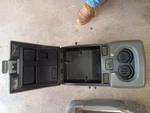 2004-2008 Ford F-150 Center Console Jump Seat Armrest Cup Holder. Fixed Price $154.00.