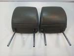 Two (2) Rear Gray Leather Headrests From 2012 Nissan Frontier 12420774. Fixed Price $209.69.