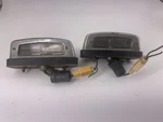 Datsun B210 License Plate Lights Iki 6021 Lenses. Fixed Price $20.00.